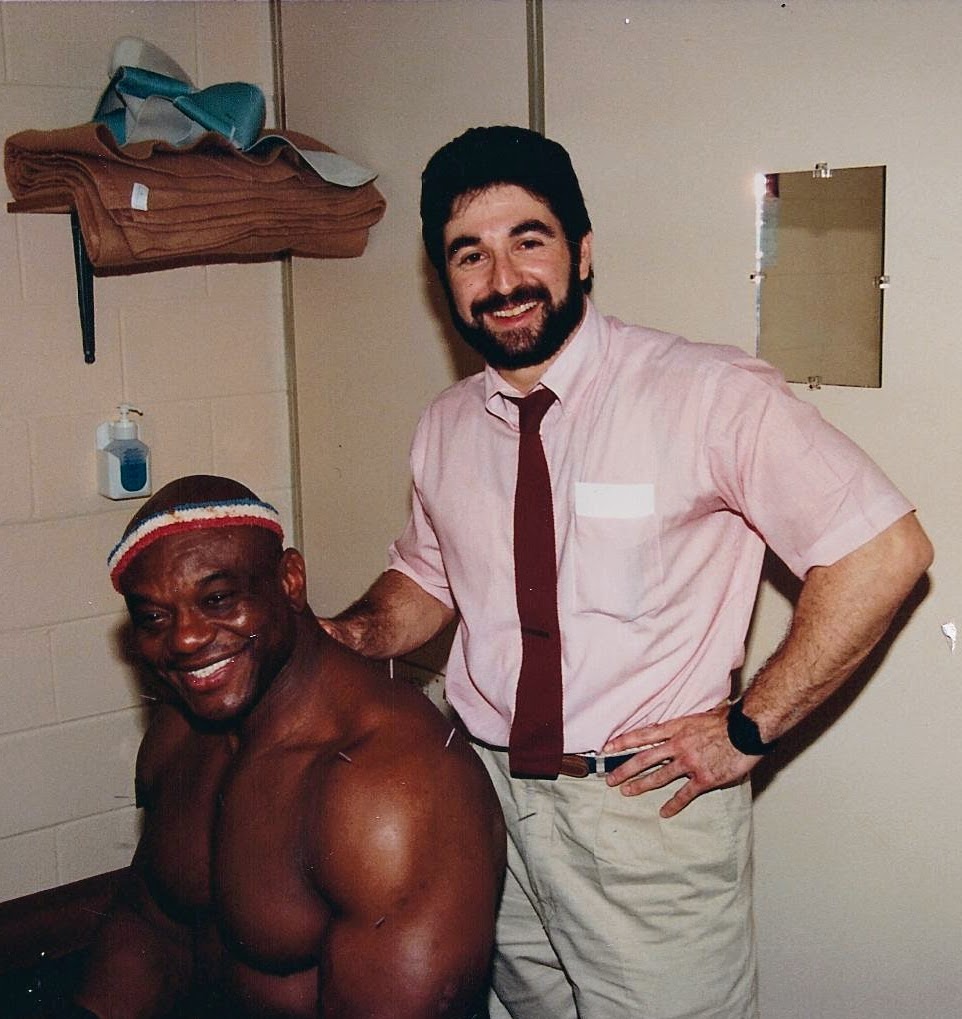 Dr. Steve Segal performing an acupuncture treatment as part of chiropractic care in Libertyville, Illinois.